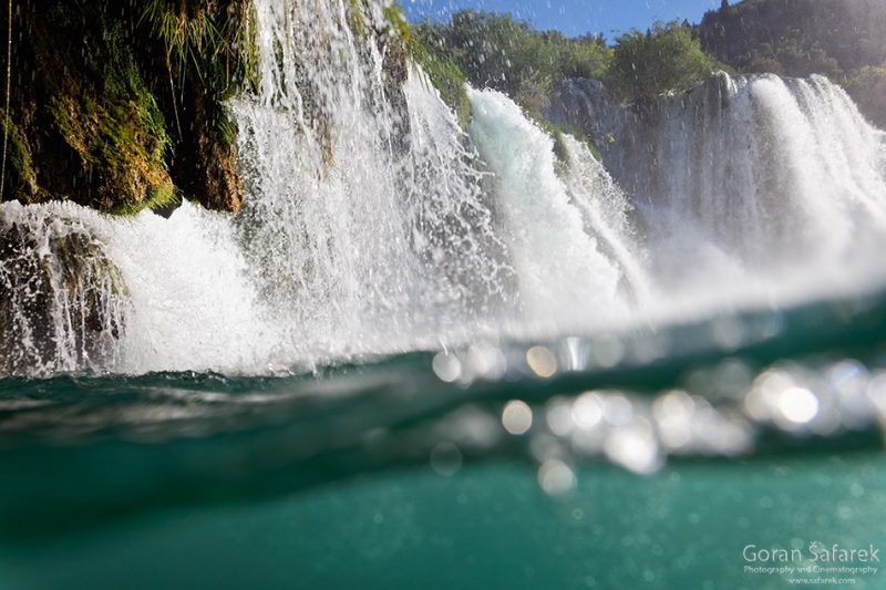 Under the waterfalls